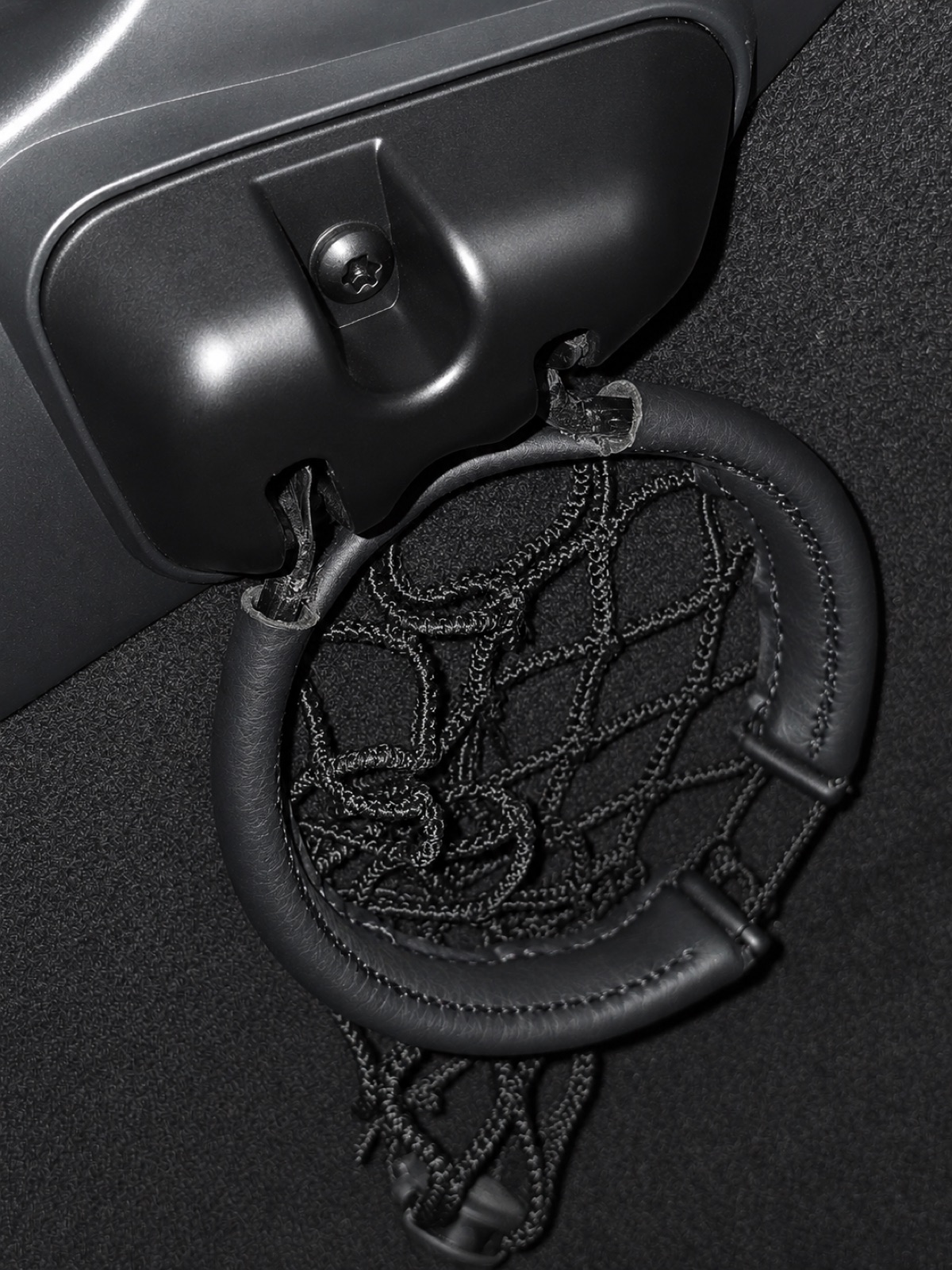 Step 2: Fold the cupholder down and slide the seat back