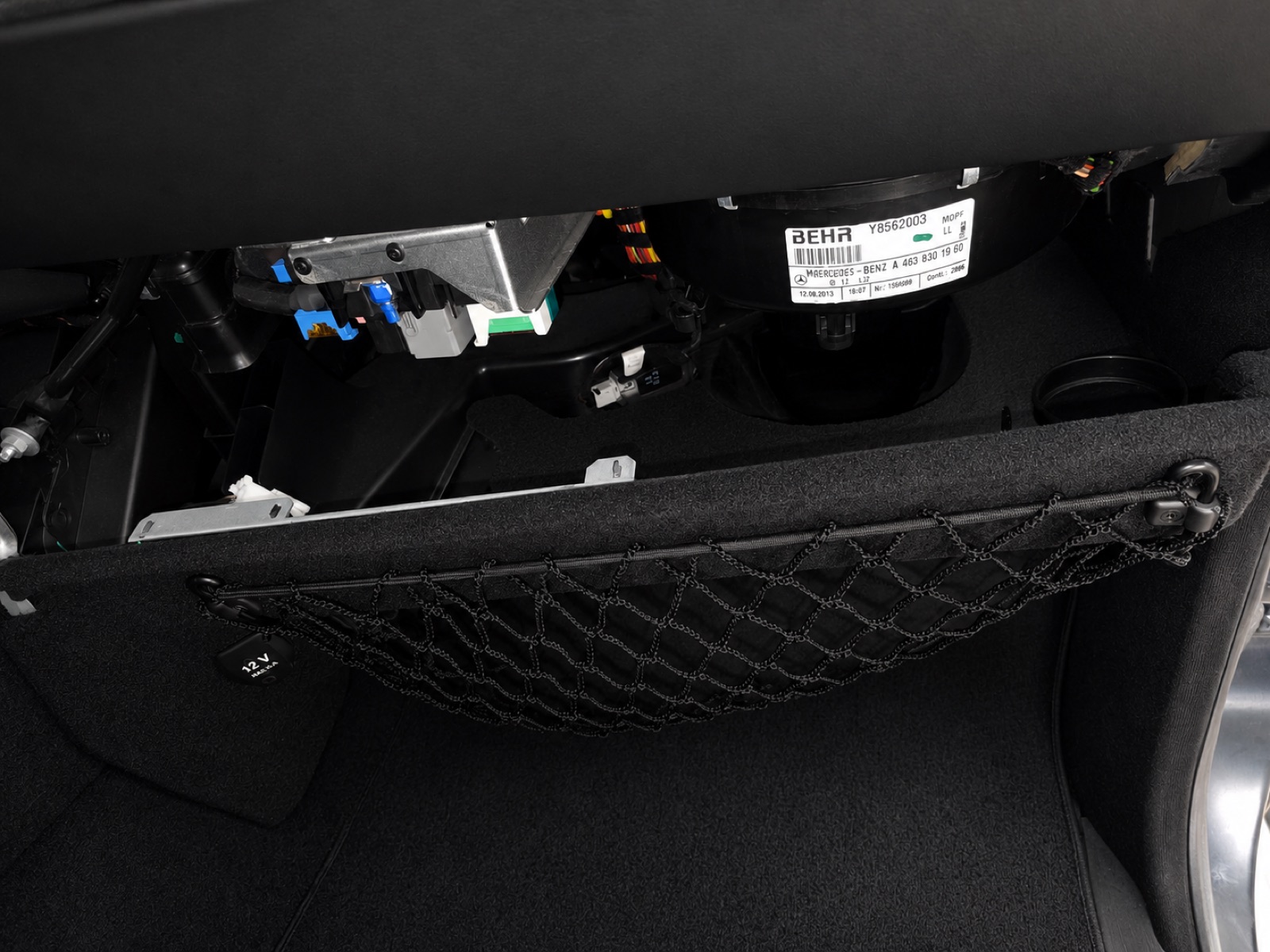 Step 5: Lower the panel under the glove box